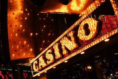 Live dealer hosting Galactic Gems card table with multi-camera setup